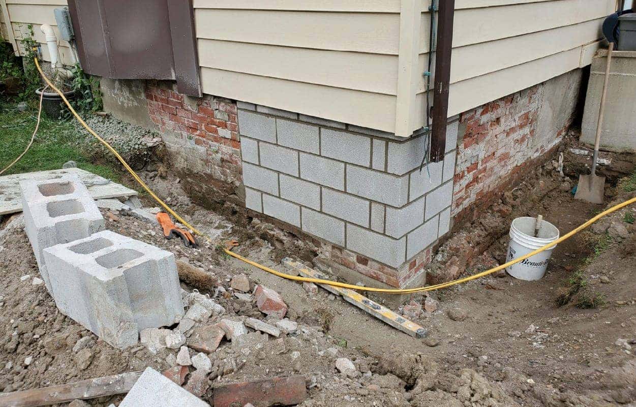 corner foundation repair stone light grey