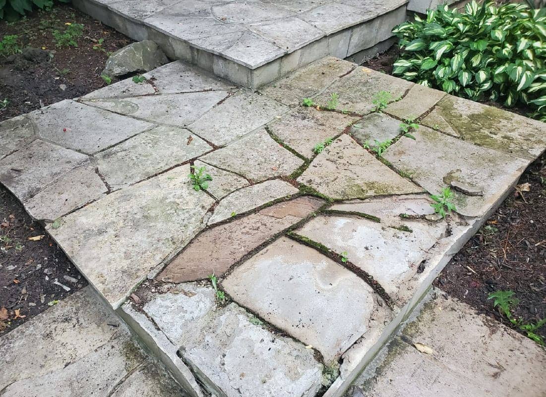 large flagstone step crumbling
