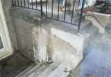 crumbled concrete steps